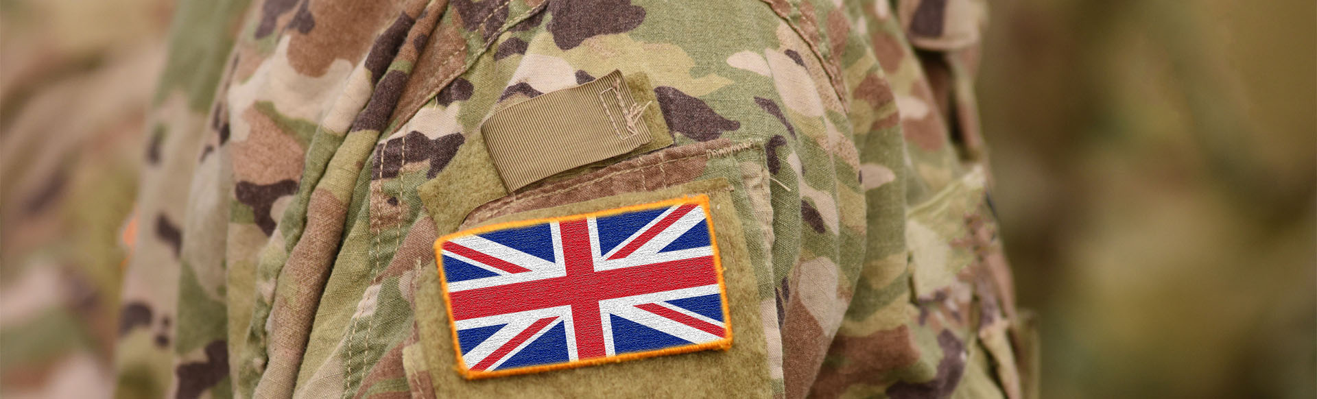 Image showing a close up of an army officer with a patch of the United Kingdom flag on his arm