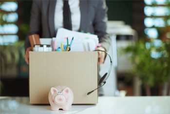 man holding a box with office supplies