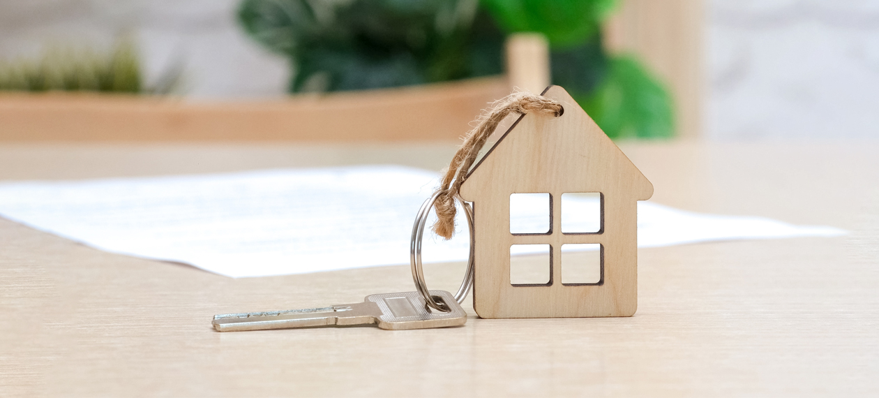 Image showing a house made of wood and a key