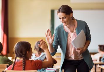 Image showing a teacher in her class