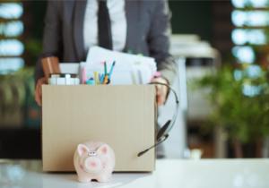 man holding a box with office supplies